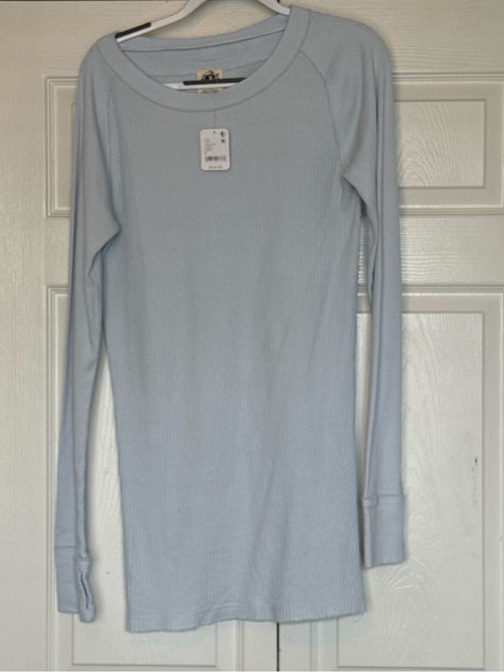 We The Free light blue ribbed waffle long sleeve top. New with tags. Retail $68